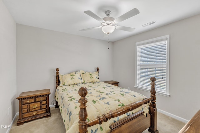 bedroom featuring carpet floors, visible vents, ceiling fan, and baseboards