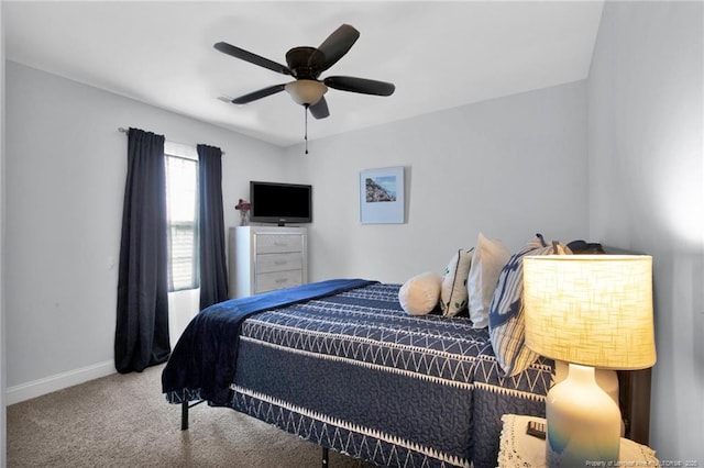 bedroom featuring carpet floors, ceiling fan, and baseboards