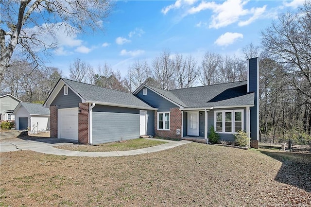 ranch-style house featuring a garage, brick siding, a chimney, and a front yard