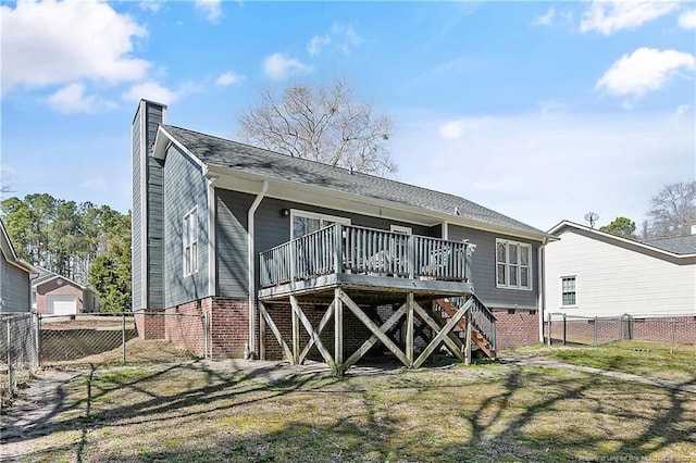 back of house with a yard, a chimney, stairway, a deck, and fence private yard