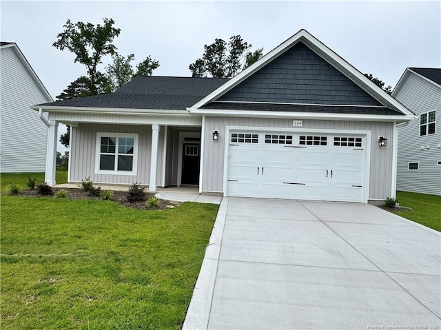 364 Whitestone Dr, Fayetteville, NC 28312 - view of front of property with a front lawn, concrete driveway, an attached garage, board and batten siding, and a porch