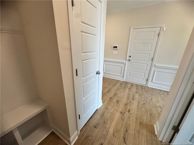 364 Whitestone Dr, Fayetteville, NC 28312 - mudroom featuring wood finished floors, crown molding, a wainscoted wall, and a decorative wall