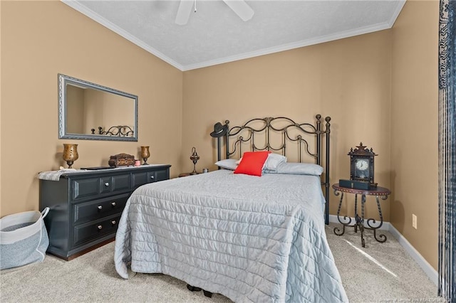 bedroom featuring carpet flooring, crown molding, baseboards, and ceiling fan