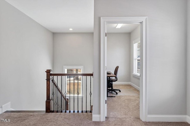 office featuring baseboards and carpet floors