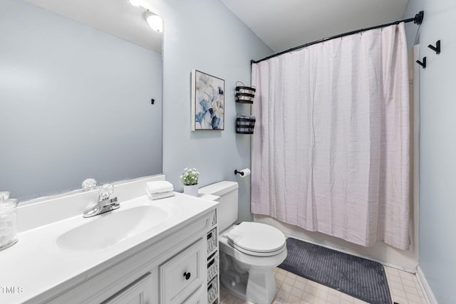 full bathroom with vanity, toilet, and shower / tub combo with curtain