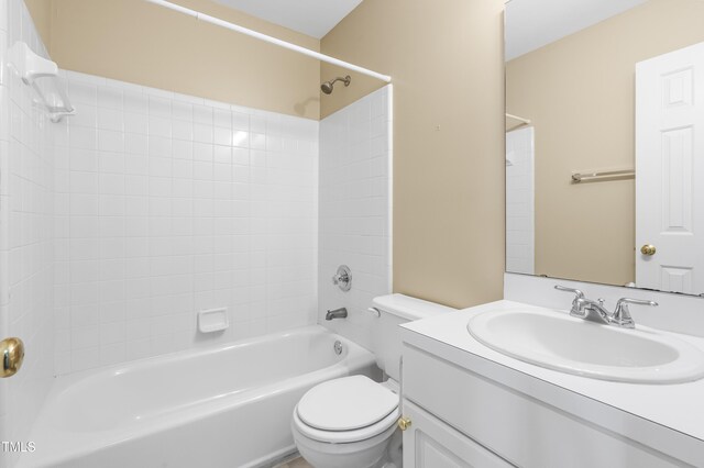 full bathroom with toilet, vanity, and shower / bathtub combination