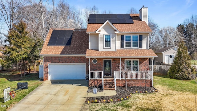 traditional home with a front yard, covered porch, driveway, and roof with shingles