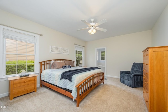 1208 Dunn Creek Xing, Wake Forest, NC 27587 - bedroom featuring light colored carpet, multiple windows, and baseboards