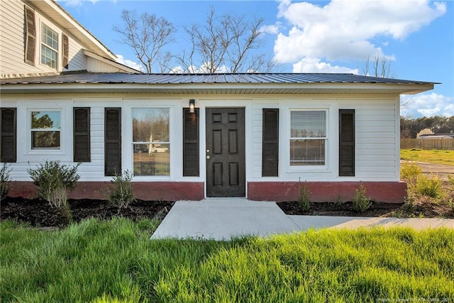 173 Style Dr, Parkton, NC 28371 - view of exterior entry with metal roof