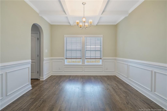 unfurnished dining area with arched walkways, coffered ceiling, dark wood-style flooring, beamed ceiling, and a notable chandelier