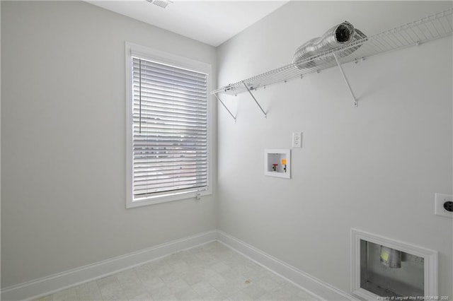 laundry room featuring laundry area, baseboards, hookup for an electric dryer, light floors, and washer hookup