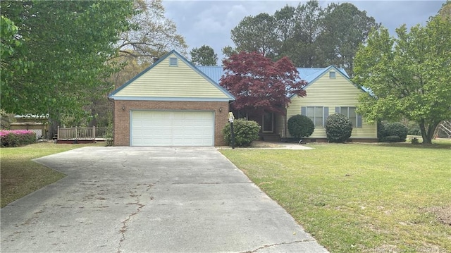 107 Oakmont Dr, Clinton, NC 28328 - ranch-style home with an attached garage, concrete driveway, and a front yard