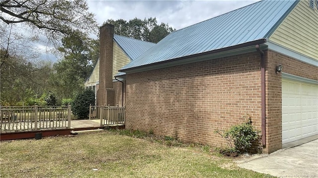 107 Oakmont Dr, Clinton, NC 28328 - view of side of property featuring a lawn, a chimney, a deck, and brick siding