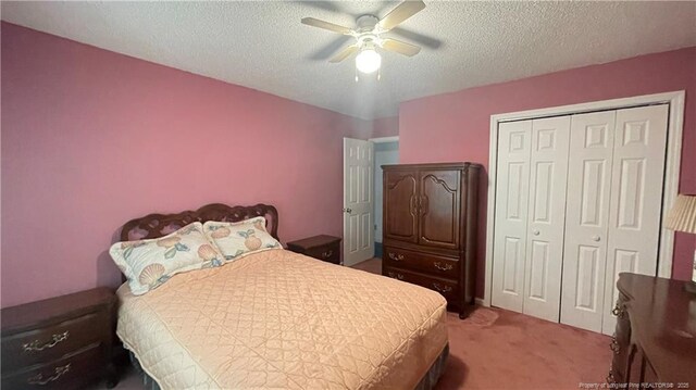 107 Oakmont Dr, Clinton, NC 28328 - bedroom with light colored carpet, a closet, ceiling fan, and a textured ceiling
