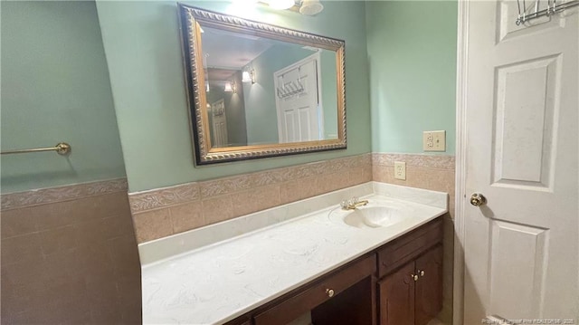 107 Oakmont Dr, Clinton, NC 28328 - bathroom with tile walls, wainscoting, and vanity
