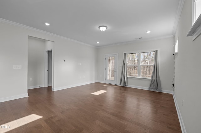 empty room with recessed lighting, baseboards, dark wood finished floors, and crown molding