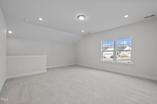 bonus room featuring recessed lighting, visible vents, baseboards, and vaulted ceiling