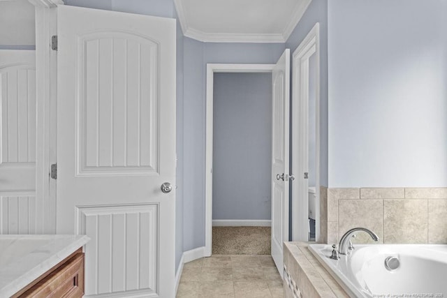 full bath with baseboards, tile patterned floors, crown molding, vanity, and a bath