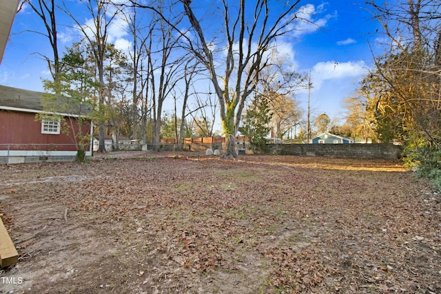 view of yard featuring fence