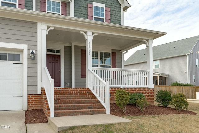 doorway to property with a porch