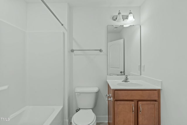 full bath with bathtub / shower combination, baseboards, vanity, and toilet