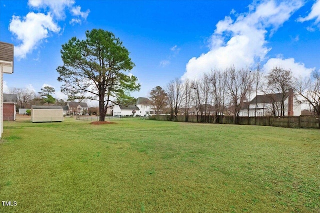 view of yard featuring fence