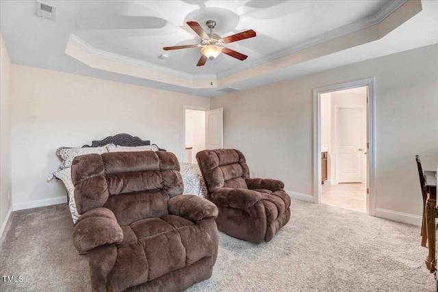 interior space featuring visible vents, baseboards, carpet, a raised ceiling, and crown molding