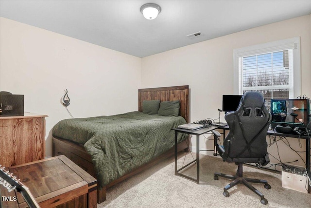 bedroom with carpet and visible vents