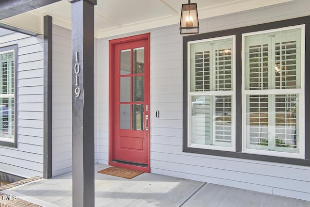 property entrance featuring covered porch