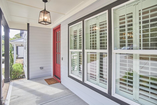 doorway to property featuring covered porch