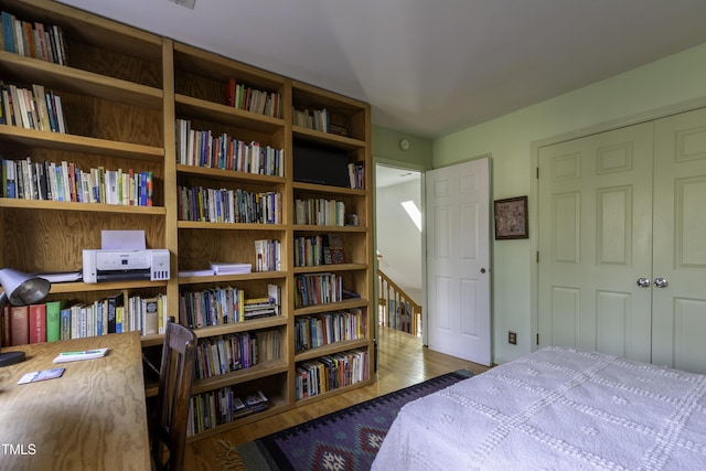 bedroom with wood finished floors