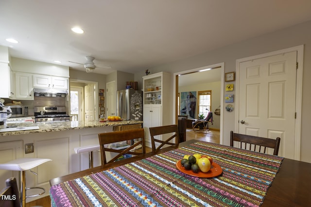 dining area featuring recessed lighting and a ceiling fan