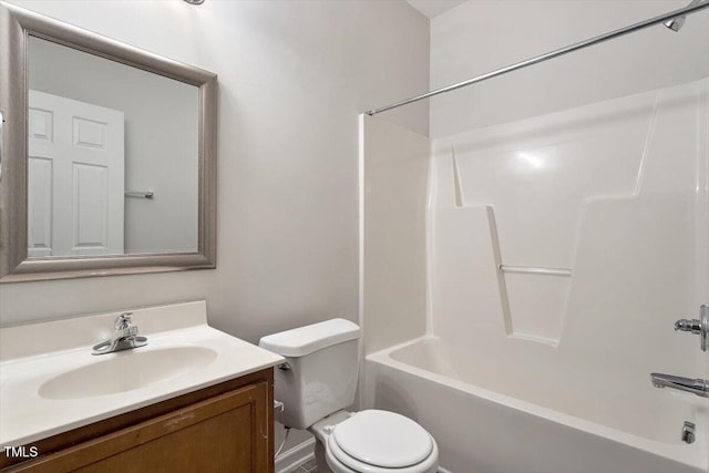 full bathroom featuring shower / bathing tub combination, vanity, and toilet