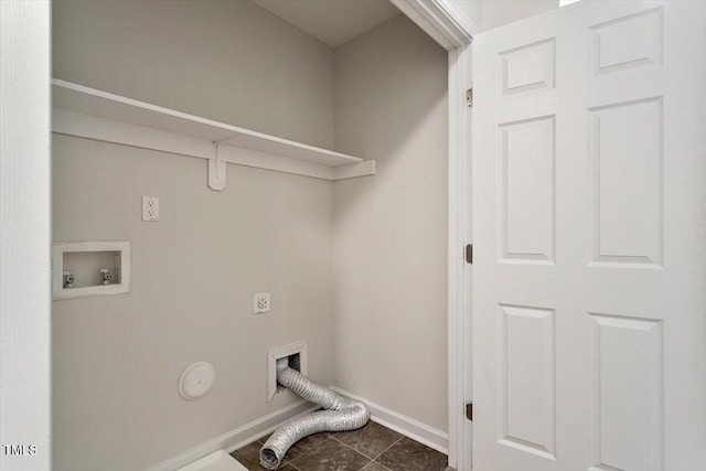 laundry room featuring laundry area, baseboards, dark tile patterned flooring, hookup for an electric dryer, and washer hookup