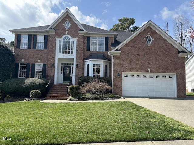 view of front of home featuring concrete driveway, brick siding, and a front lawn