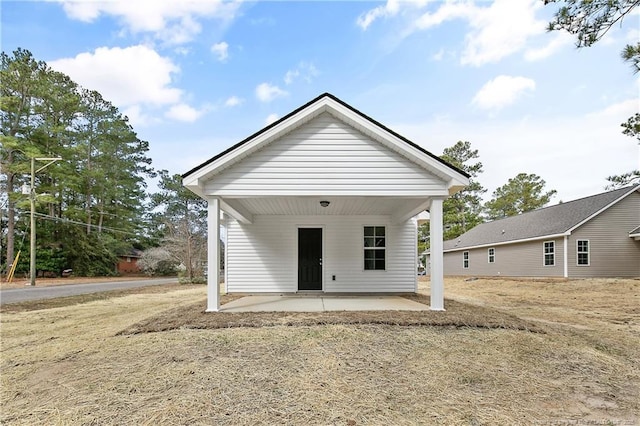 back of house with a patio area