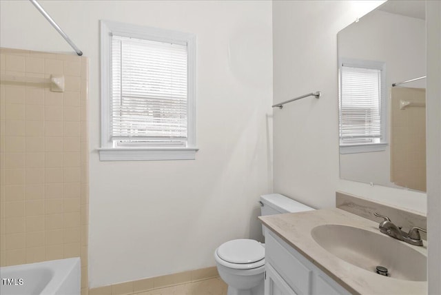 bathroom featuring shower / tub combination, vanity, and toilet