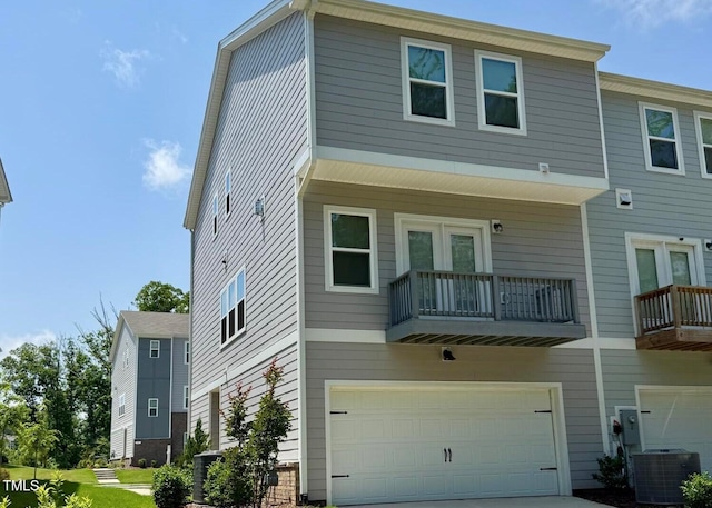 730 Firebrick Dr, Cary, NC 27519 - view of front of property with central AC unit, an attached garage, and concrete driveway