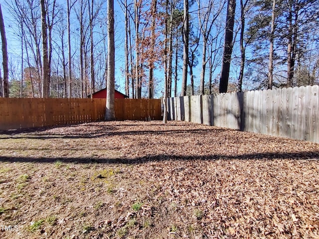 view of yard featuring a fenced backyard