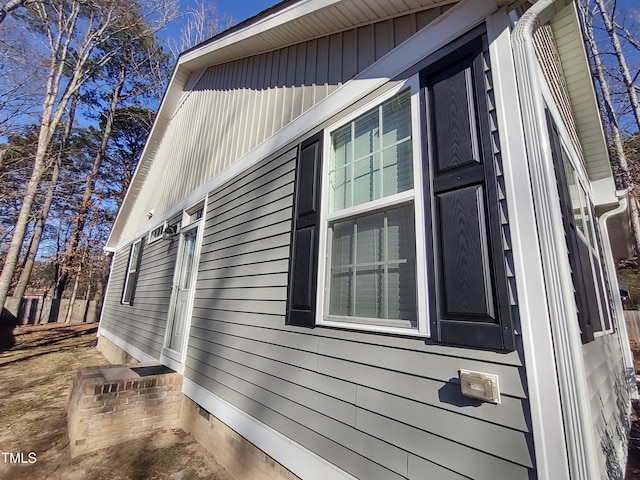 view of side of property featuring crawl space