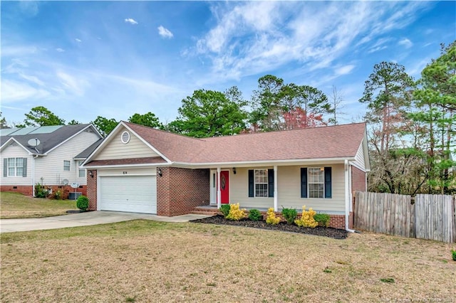 ranch-style home with a front lawn, an attached garage, fence, and concrete driveway