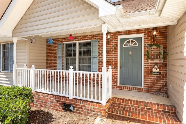 property entrance with a porch