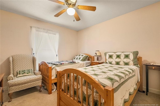 bedroom featuring carpet floors and a ceiling fan