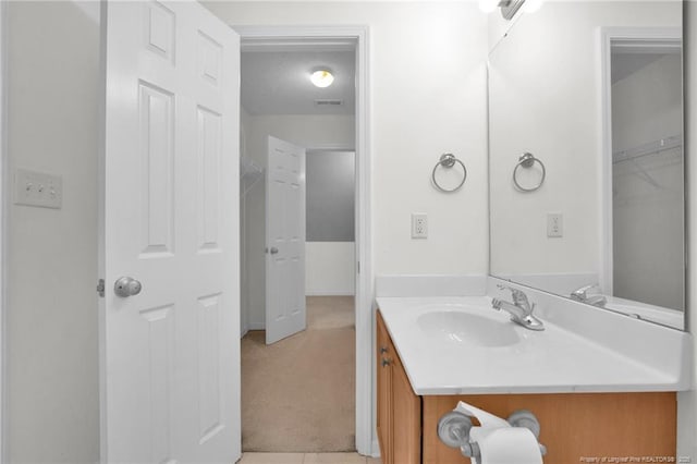 bathroom featuring visible vents and vanity