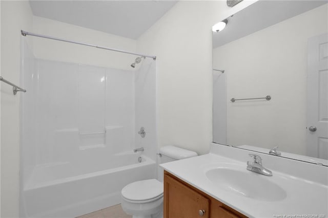 bathroom featuring shower / washtub combination, vanity, and toilet