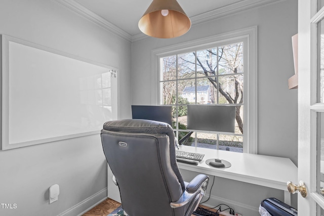 office area featuring baseboards and ornamental molding