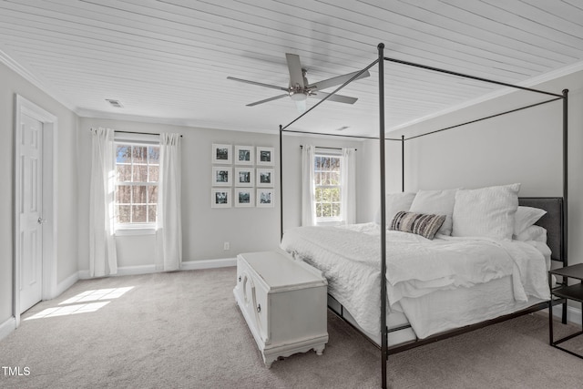 bedroom with crown molding, baseboards, ceiling fan, light colored carpet, and wood ceiling