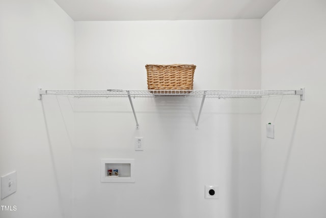 laundry room with washer hookup and electric dryer hookup