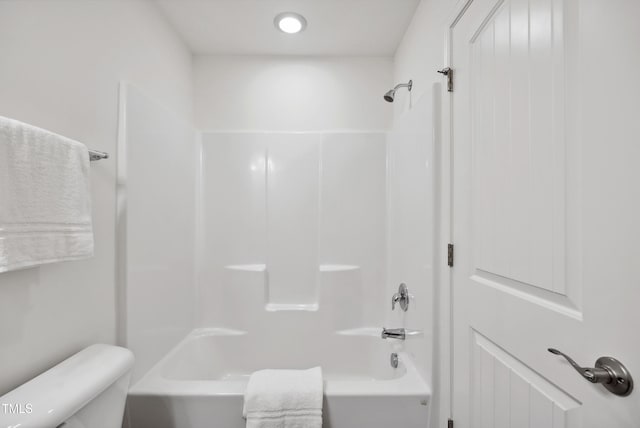 full bathroom featuring toilet and  shower combination