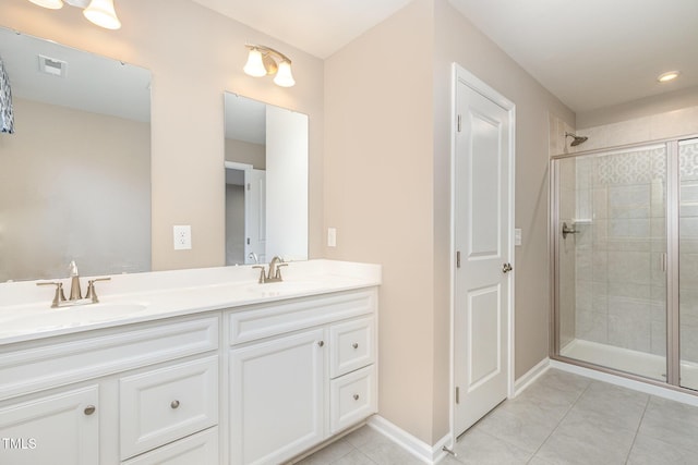 full bath featuring a sink, visible vents, and a stall shower